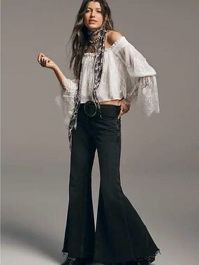 We the Free Emre Low-Rise Flare Jeans at Free People in Black Orchid